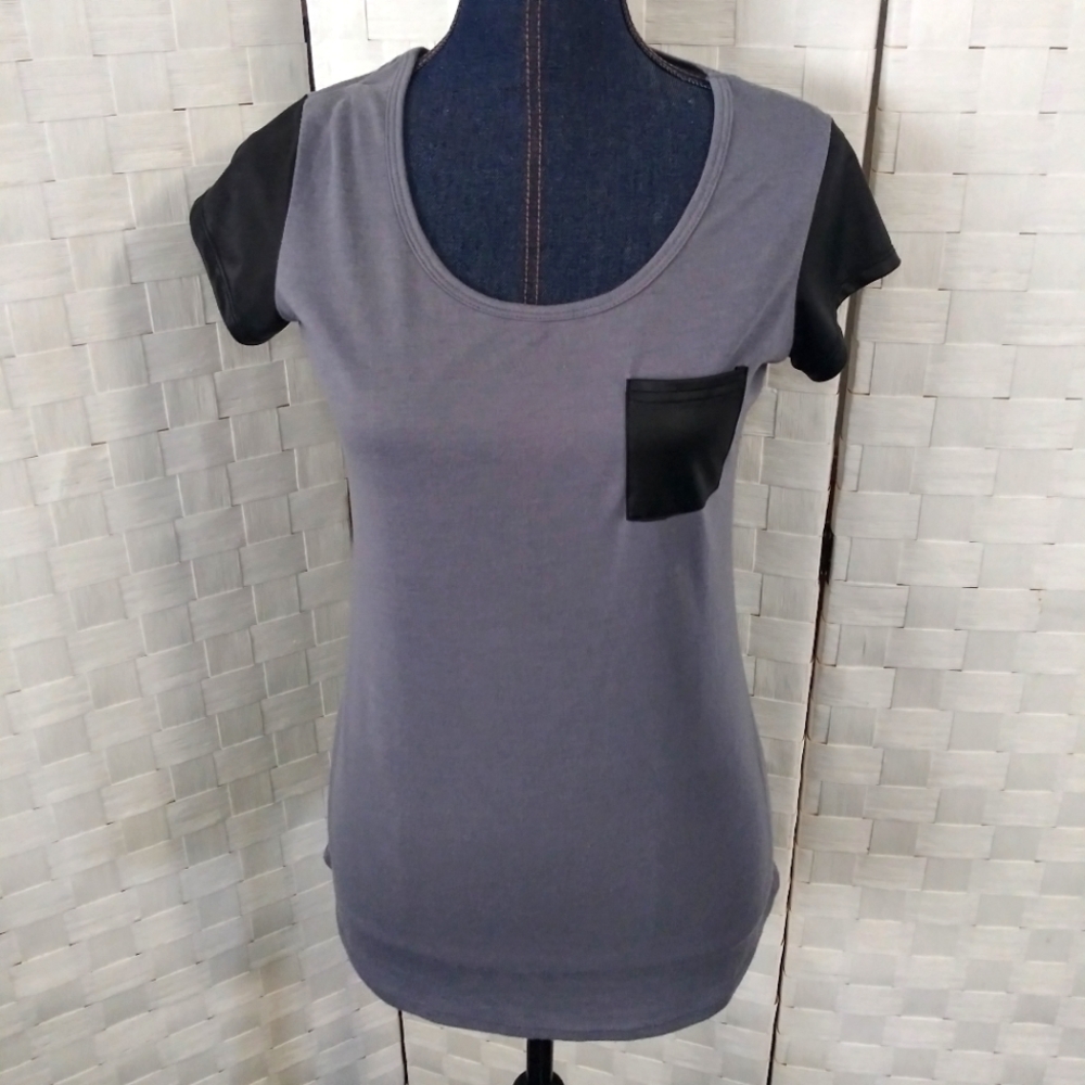 - Derek Heart short sleeve size M gray tee with black sleeves and pocket